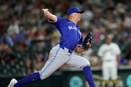 Toronto Blue Jays pitcher Chad Green (57) throws a pitch against the Athletics during the eighth inning at Sutter Health Park
