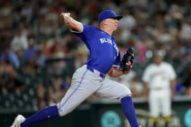 Toronto Blue Jays pitcher Chad Green (57) throws a pitch against the Athletics during the eighth inning at Sutter Health Park