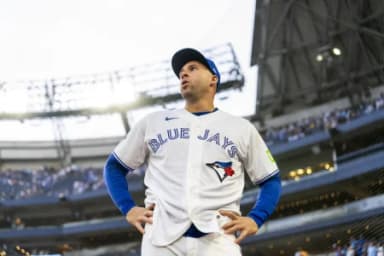Toronto Blue Jays designated hitter George Springer (4) takes a moment after playing his final MLB game against the Cincinnati Reds at Rogers Centre.