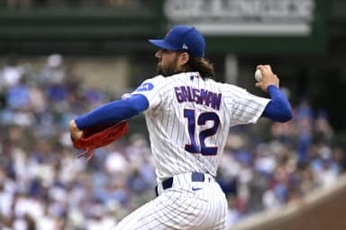 Chicago Cubs pitcher Kevin Gausman (12) delivers the ball during the first inning against the Cincinnati Reds at Wrigley Field.