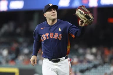 Houston Astros center fielder Daulton Varsho (18) jogs off the field before the game against the Arizona Diamondbacks at Daikin Park