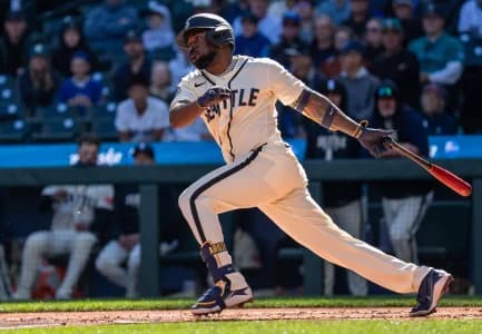 left fielder Randy Arozarena (56) takes a swing during an at-bat against the Los Angeles Angels at T-Mobile Park.