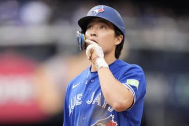Toronto Blue Jays center fielder Brett Bateman (21) reacts after hitting a single against the Cincinnati Reds during the eighth inning at Rogers Centre