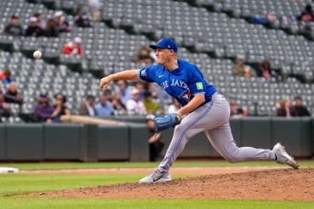 Toronto Blue Jays pitcher Paul Sewald (43) delivers a pitch during the eighth inning at Oriole Park at Camden Yards