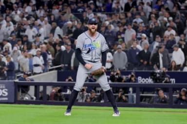 Tampa Bay Rays relief pitcher Bryan Baker (47) celebrates after defeating the New York Yankees in game three of the ALDS to win the series 3-0 during the 2026 MLB Playoffs at Yankee Stadium.