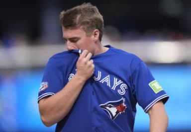 Toronto Blue Jays first baseman Sean Keys (20) comes off the field after being stranded on base against the Cincinnati Reds during the second inning at Rogers Centre.
