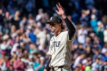 Seattle Mariners starting pitcher Logan Gilbert (36) acknowledges fans during a game against the Los Angeles Angels at T-Mobile Park.