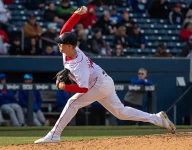 Worcester pitcher Josh Winckowski throws in the late inning against Syracuse on opening day at Polar Park.