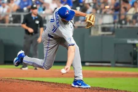Toronto Blue Jays pitcher Tyler Rogers (71) delivers a pitch against the Kansas City Royals during the eighth inning at Kauffman Stadium.