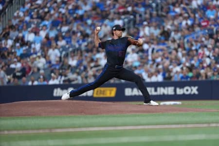 Toronto Blue Jays start pitcher Shane Bieber (57) throws a pitch against the New York Yankees during the first inning at Rogers Centre.