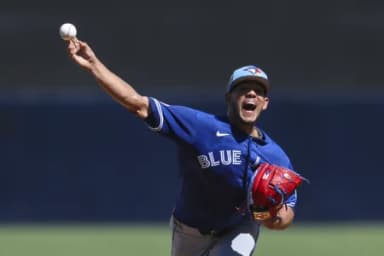 Toronto Blue Jays starting pitcher Jose Berrios (17) throws a pitch against the New York Yankees in the second inning during spring training at George M. Steinbrenner Field.