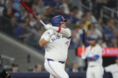 Toronto Blue Jays designated hitter Daniel Vogelbach (20) hits a two-run double against the Pittsburgh Pirates during the fifth inning at Rogers Centre