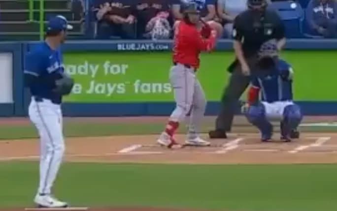 Mitch White pitching against the Red Sox