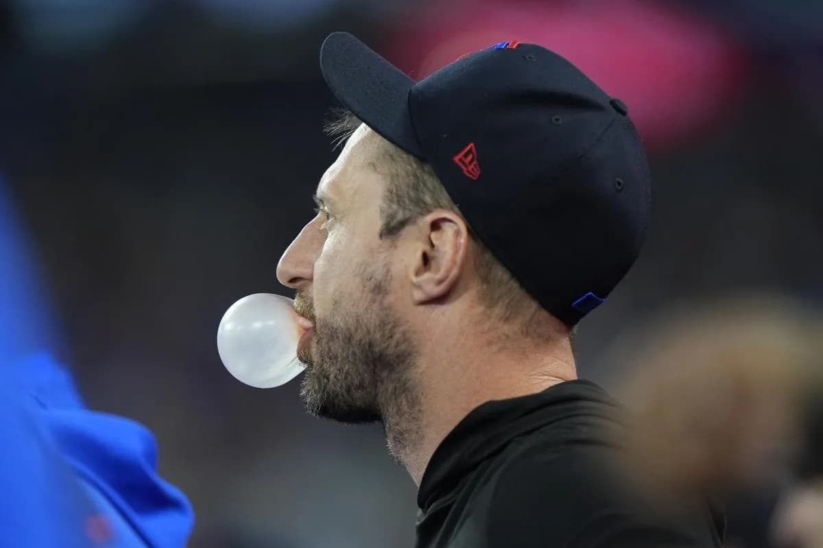 Toronto Blue Jays pitcher Max Scherzer (31) blows a bubble with gum while in the dugout during the first inning against the Tampa Bay Rays at Rogers Centre.