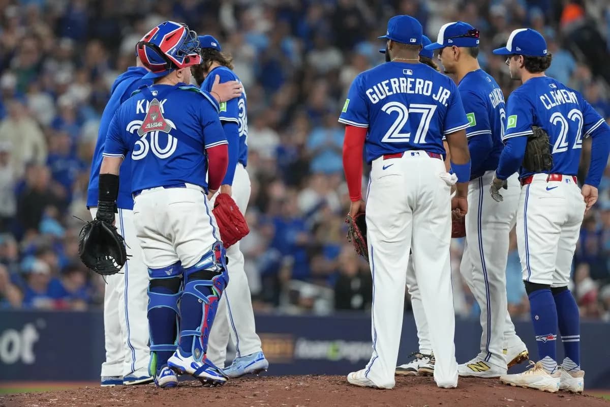 Toronto Blue Jays pitcher Kevin Gausman (34) is removed from the game in the sixth inning against the Seattle Mariners during game one of the ALCS round for the 2025 MLB playoffs at Rogers Centre.