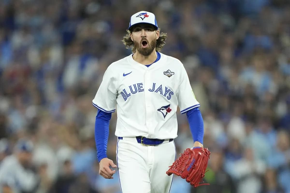 Toronto Blue Jays pitcher Kevin Gausman (34) reacts after striking out Los Angeles Dodgers second baseman Tommy Edman (25) in the second inning during game two of the 2025 MLB World Series at Rogers Centre.