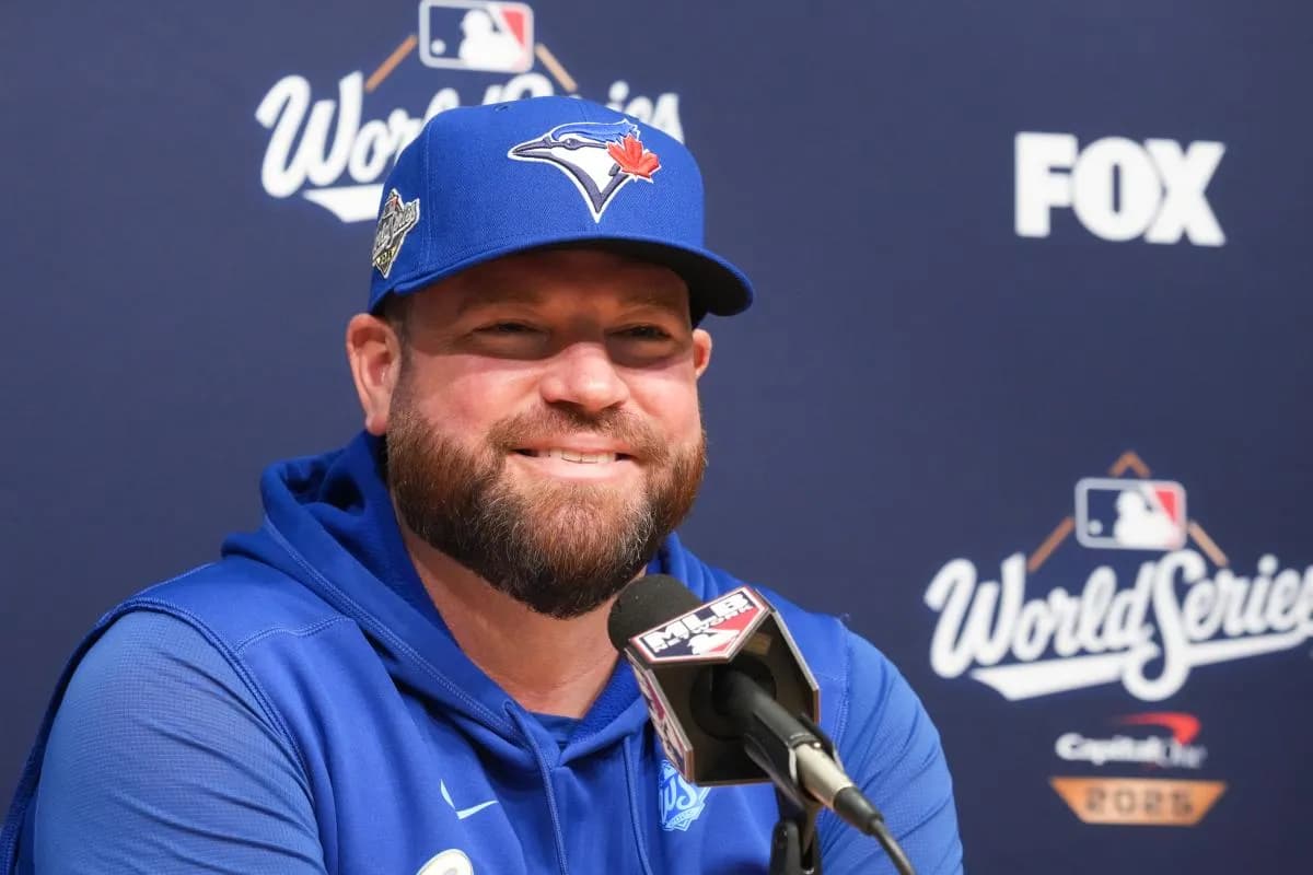 Toronto Blue Jays manager John Schneider (14) speaks at the pregame press conference before game five of the 2025 MLB World Series at Dodger Stadium.