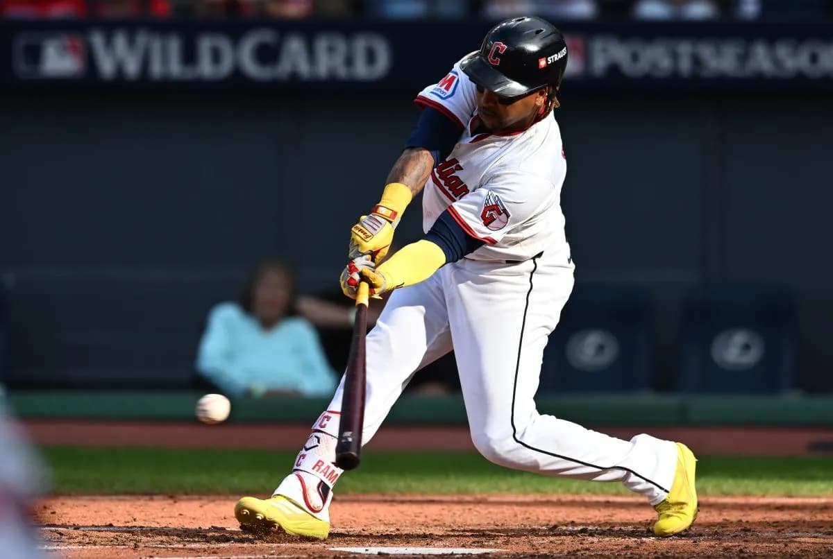 Cleveland Guardians third baseman Jose Ramirez (11) hits a RBI single in the fourth inning against the Detroit Tigers during game three of the Wildcard round for the 2025 MLB playoffs at Progressive Field.