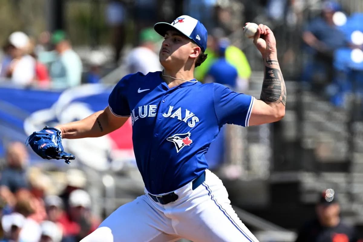 Toronto Blue Jays starting pitcher Ricky Tiedemann (70) delivers a pitch in the first inning of a spring training game against the Detroit Tigers at TD Ballpark.