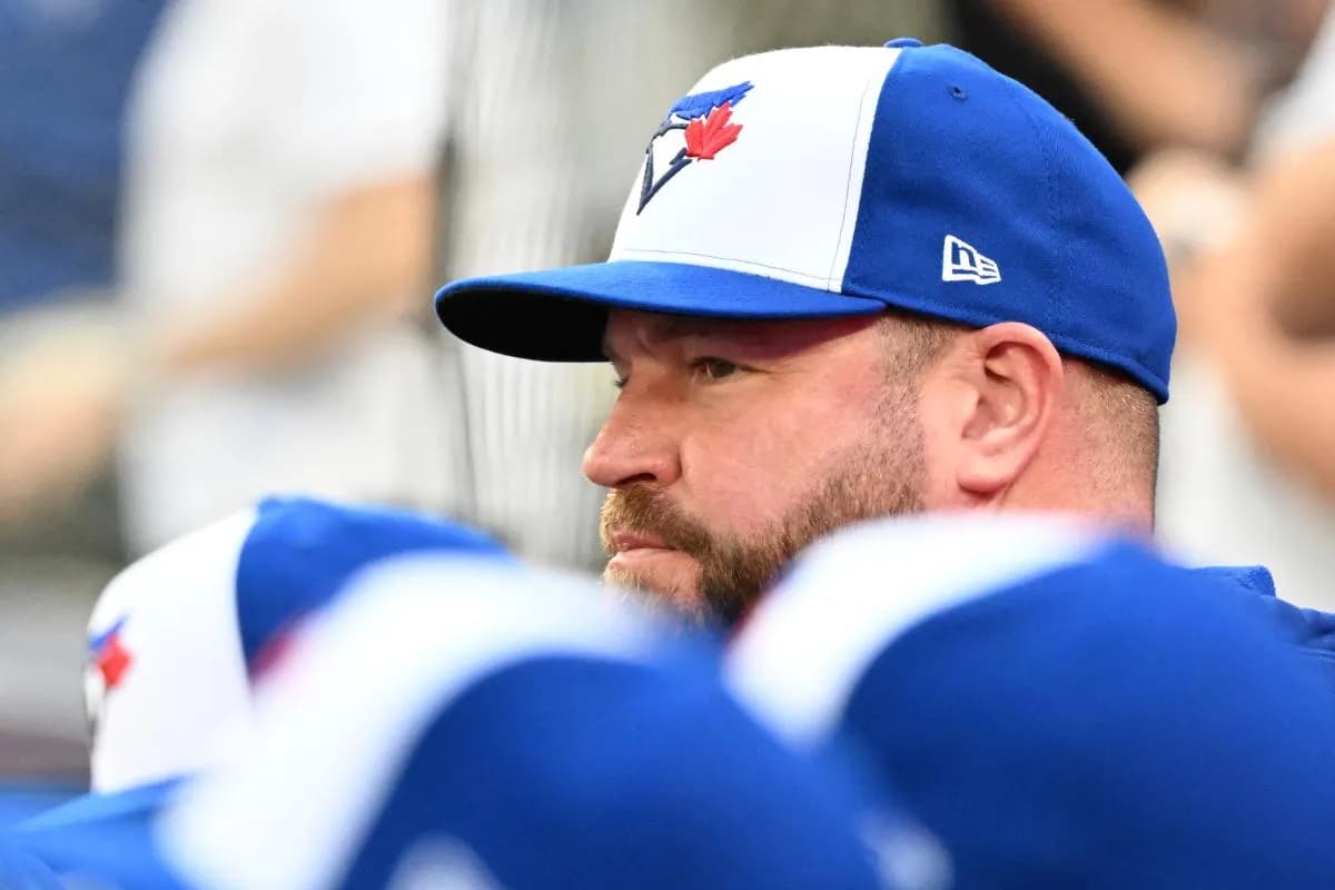 Toronto Blue Jays manager John Schneider (14) watches play against the Tampa Bay Rays in the ninth inning at Rogers Centre.