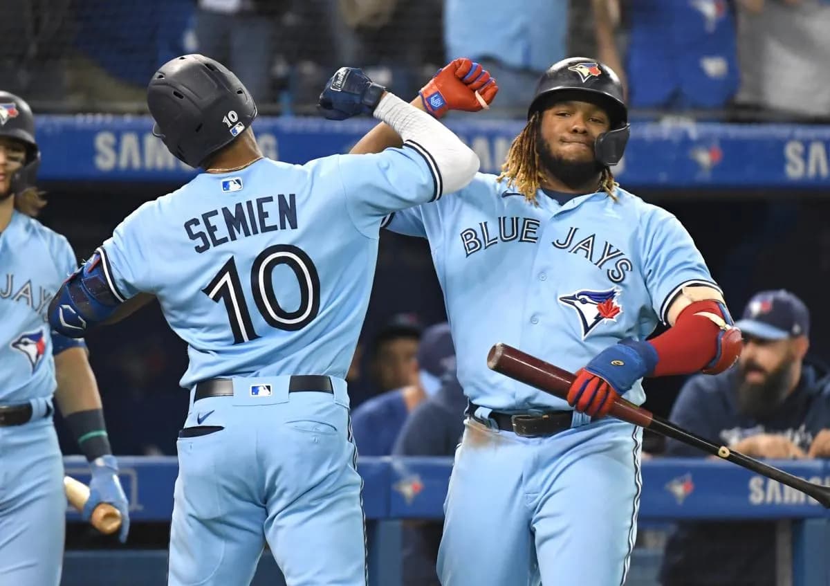 Toronto Blue Jays second baseman Marcus Semien (10) is greeted by first baseman Vladimir Guererro Jr. (27) after hitting a solo home run against Baltimore Orioles in the fifth inning at Rogers Centre.