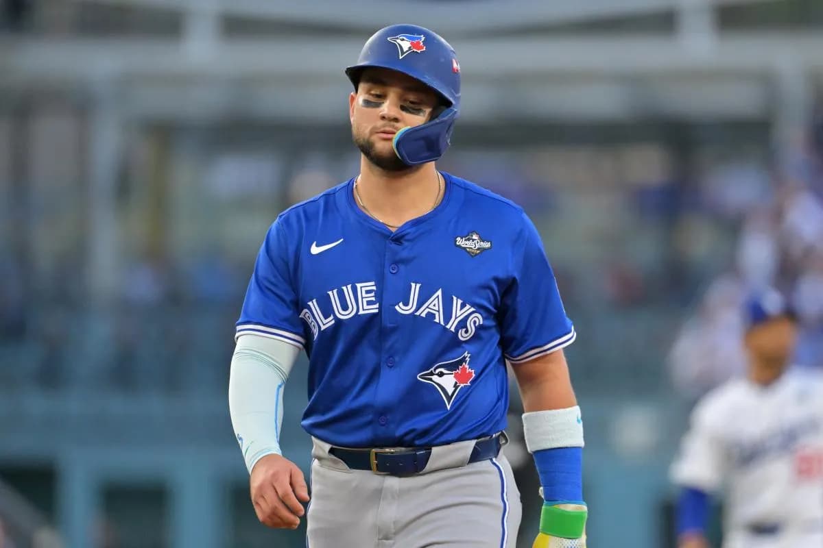 Toronto Blue Jays second baseman Bo Bichette (11) reacts in the second inning against the Los Angeles Dodgers during game three of the 2025 MLB World Series at Dodger Stadium.