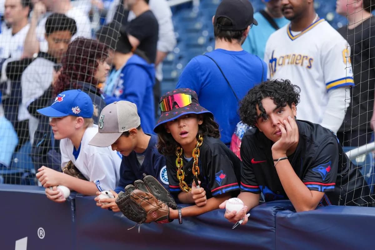 Fans watch batting practice prior to game two of the ALCS round between the Toronto Blue Jays and Seattle Mariners for the 2025 MLB playoffs at Rogers Centre.