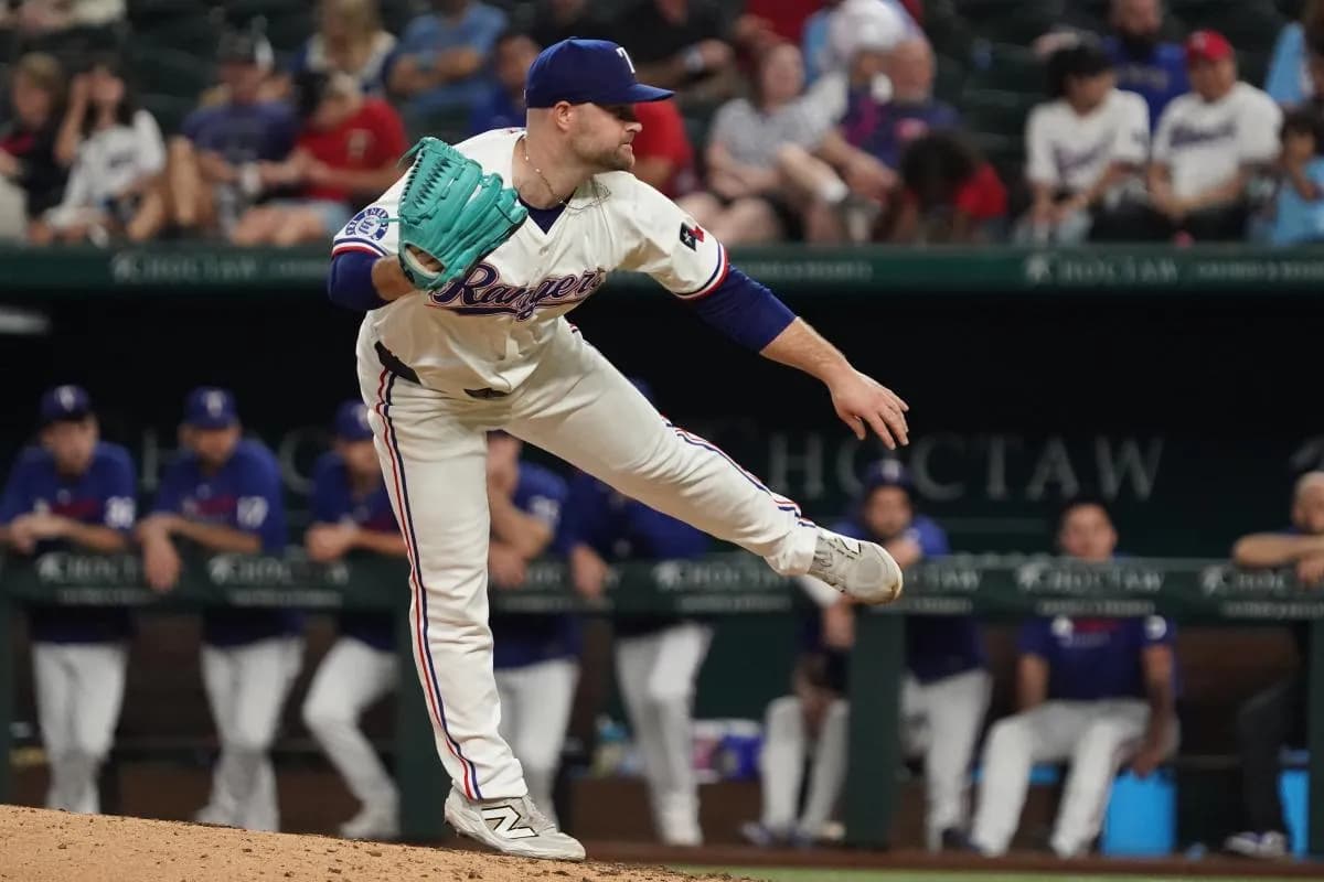 Texas Rangers pitcher Danny Coulombe (54) follows through on a pitch during the ninth inning against the Minnesota Twins at Globe Life Field.