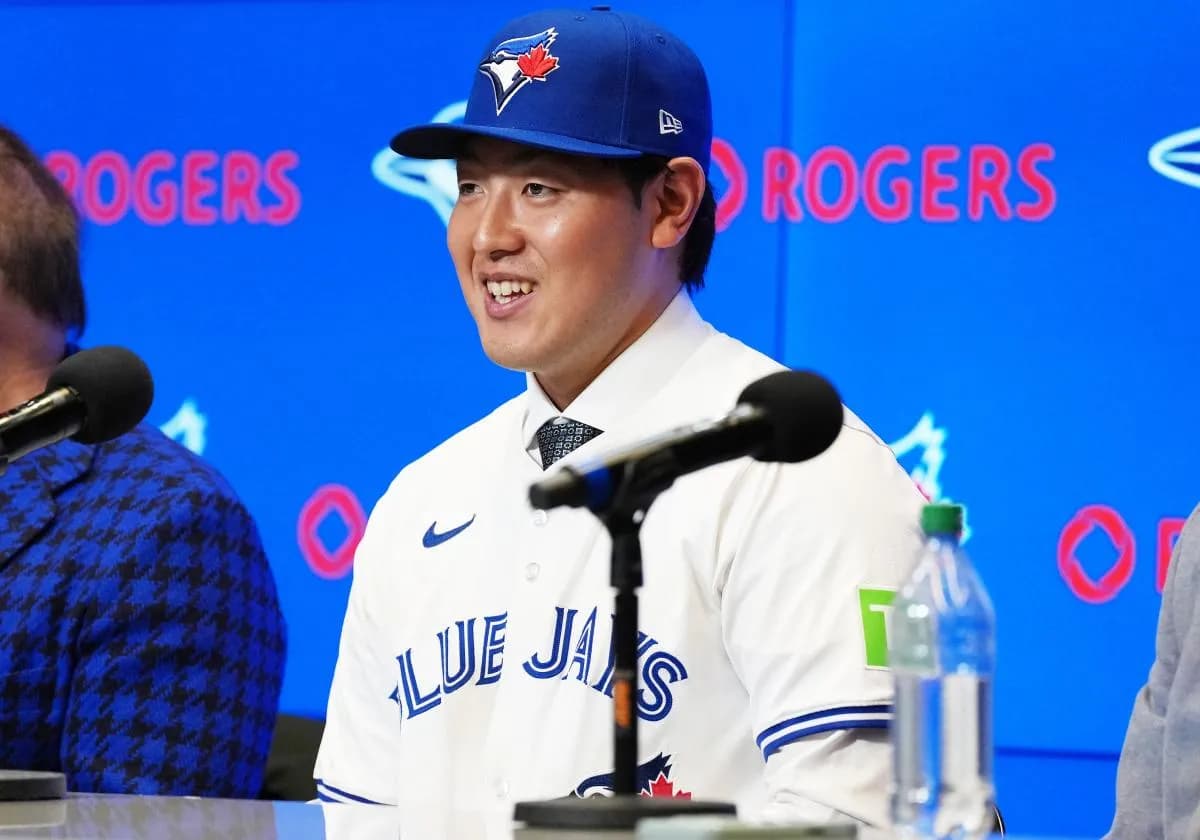 Toronto Blue Jays Kazuma Okamoto speaks to the media during the press conference at Rogers Centre.
