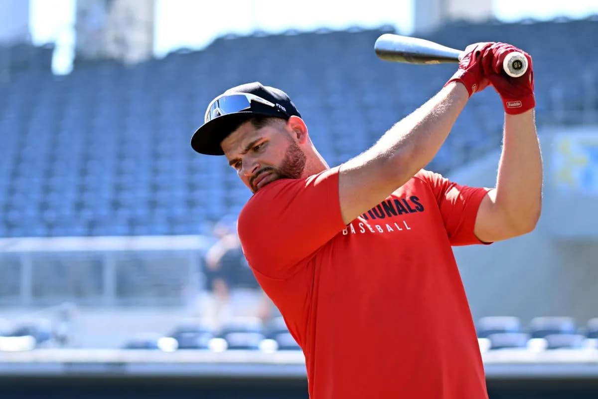 Washington Nationals first baseman Juan Yepez (18) warms up before the start of the game against the Tampa Bays Rays during spring training at Charlotte Sports Park.