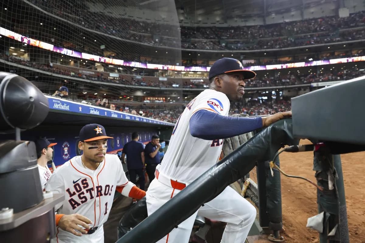 Houston Astros left fielder Jesus Sanchez (4) and right fielder Cam Smith (11) take the field before the game against the Seattle Mariners at Daikin Park