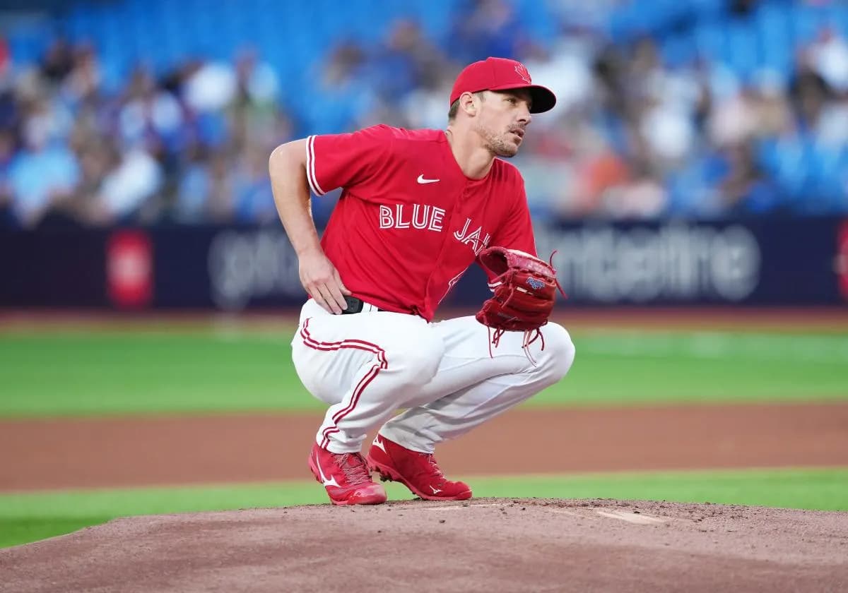 Toronto Blue Jays starting pitcher Chris Bassitt (40) adjusts his Pitchcom against the Baltimore Orioles during the first inning at Rogers Centre.