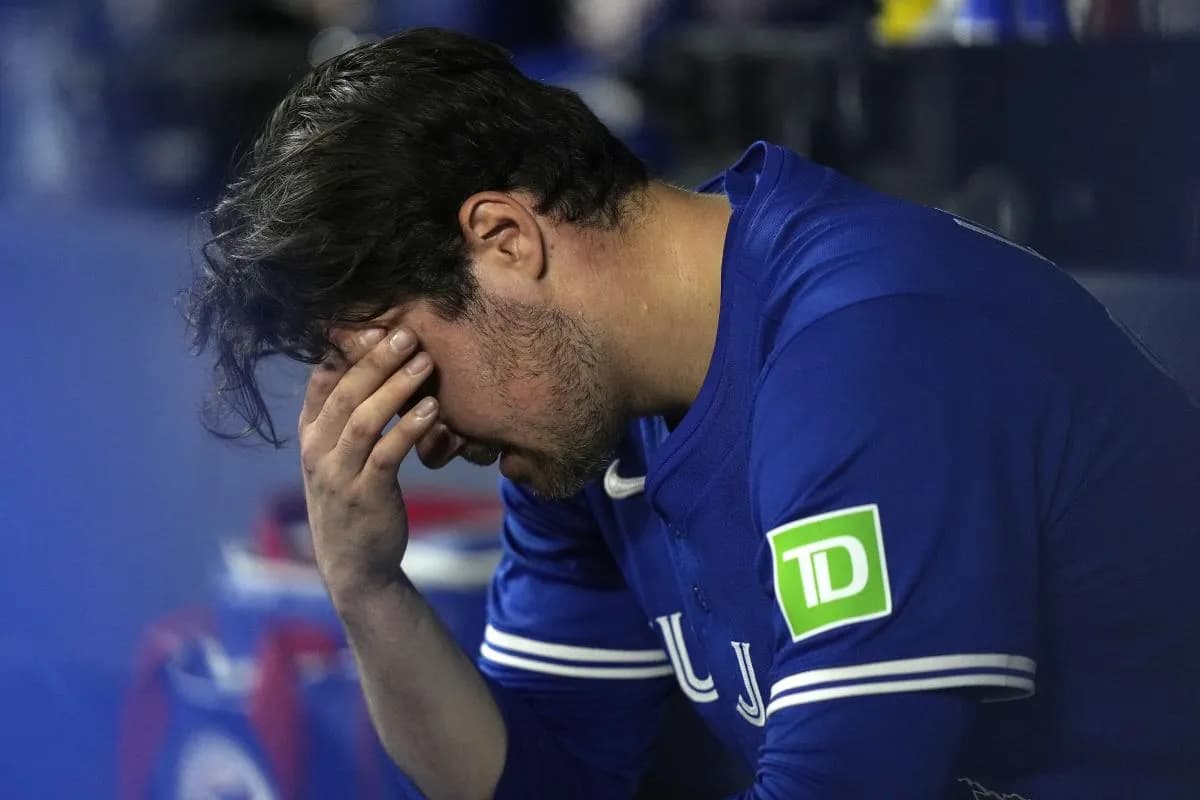 Toronto Blue Jays pitcher Brendon Little (54) in the dug out during the tenth inning against the San Diego Padres at Rogers Centre.
