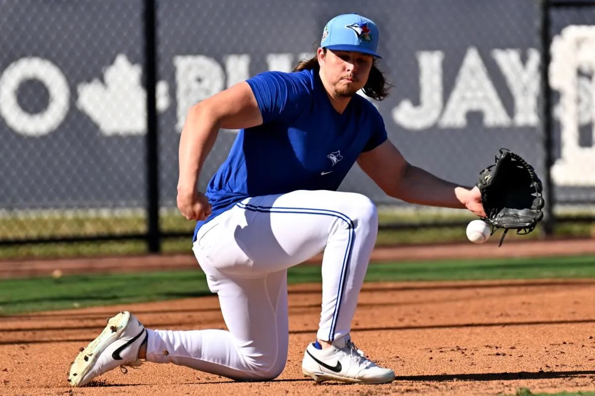 Toronto Blue Jays outfielder Addison Barger (47) fields a ground ball during spring training at Bobby Mattick Training Center at Englebert Complex.