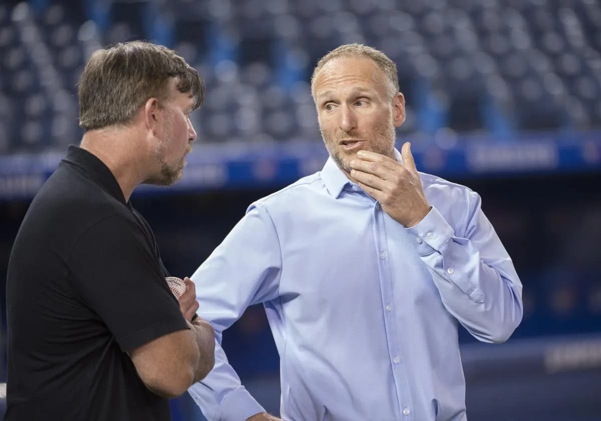 Toronto Blue Jays president and CEO Mark Shapiro talks with the media during batting practice against the Cleveland Indians at Rogers Centre.