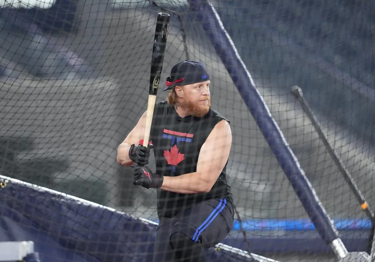 Toronto Blue Jays designated hitter Justin Turner (2) takes batting practice before a game against the Tampa Bay Rays at Rogers Centre.