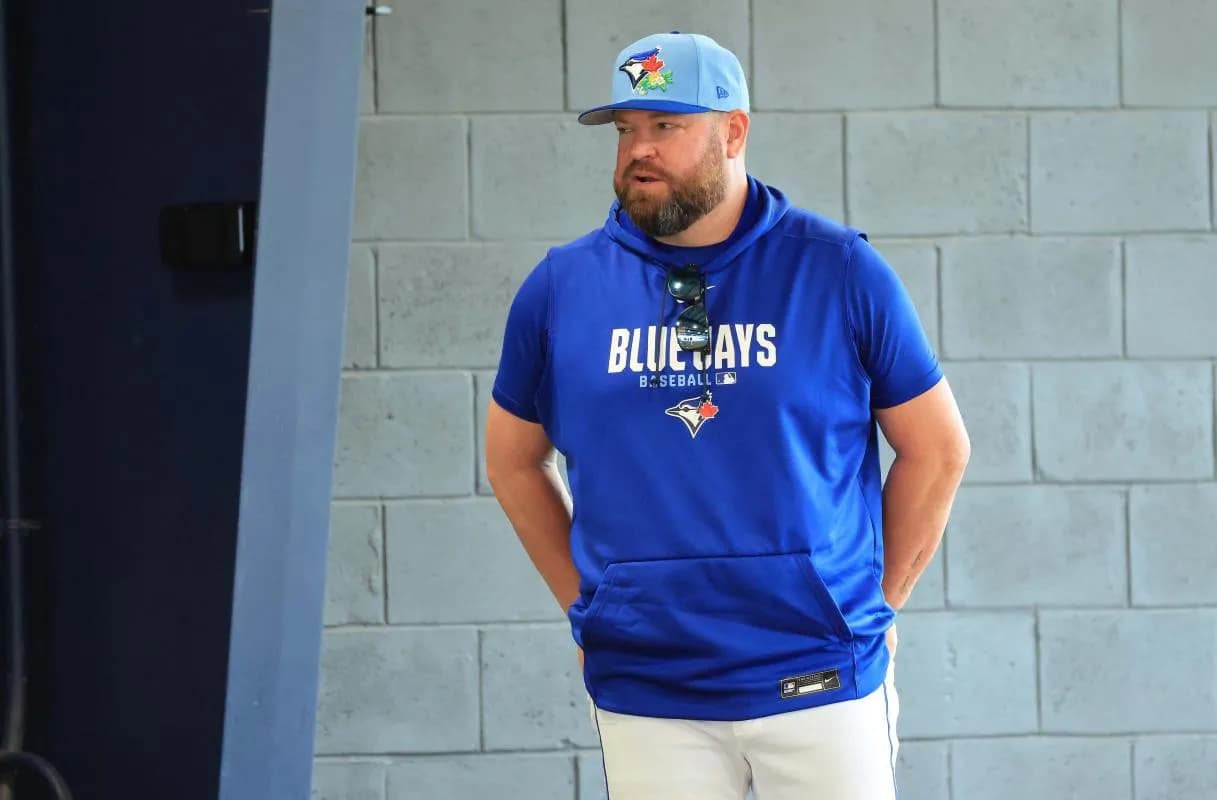 Toronto Blue Jays manager John Schneider (14) looks on for spring training practice at Blue Jays Player Development Complex.