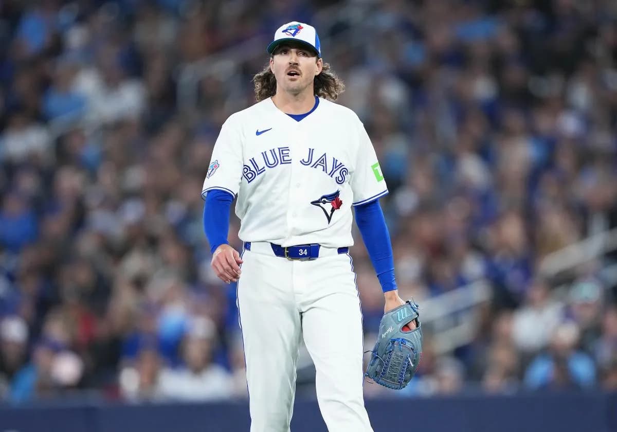 Toronto Blue Jays starting pitcher Kevin Gausman (34) walks towards the dugout against the Athletics during the fourth inning at Rogers Centre.