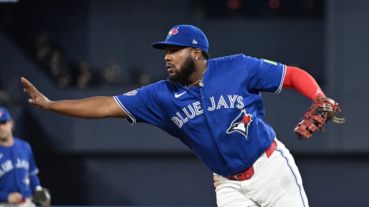 Toronto Blue Jays first baseman Vladimir Guerrero Jr. (27) waves off assistance as he makes a solo put out against the Los Angeles Dodgers in the fifth inning at Rogers Centre.