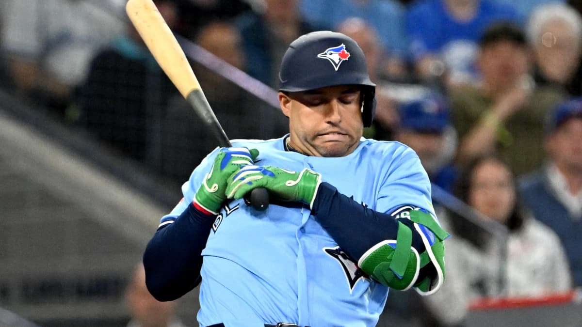 Toronto Blue Jays designated hitter George Springer (4) reacts to a high inside pitch from Colorado Rockies relief pitcher Juan Mejia in the fifth inning at Rogers Centre.