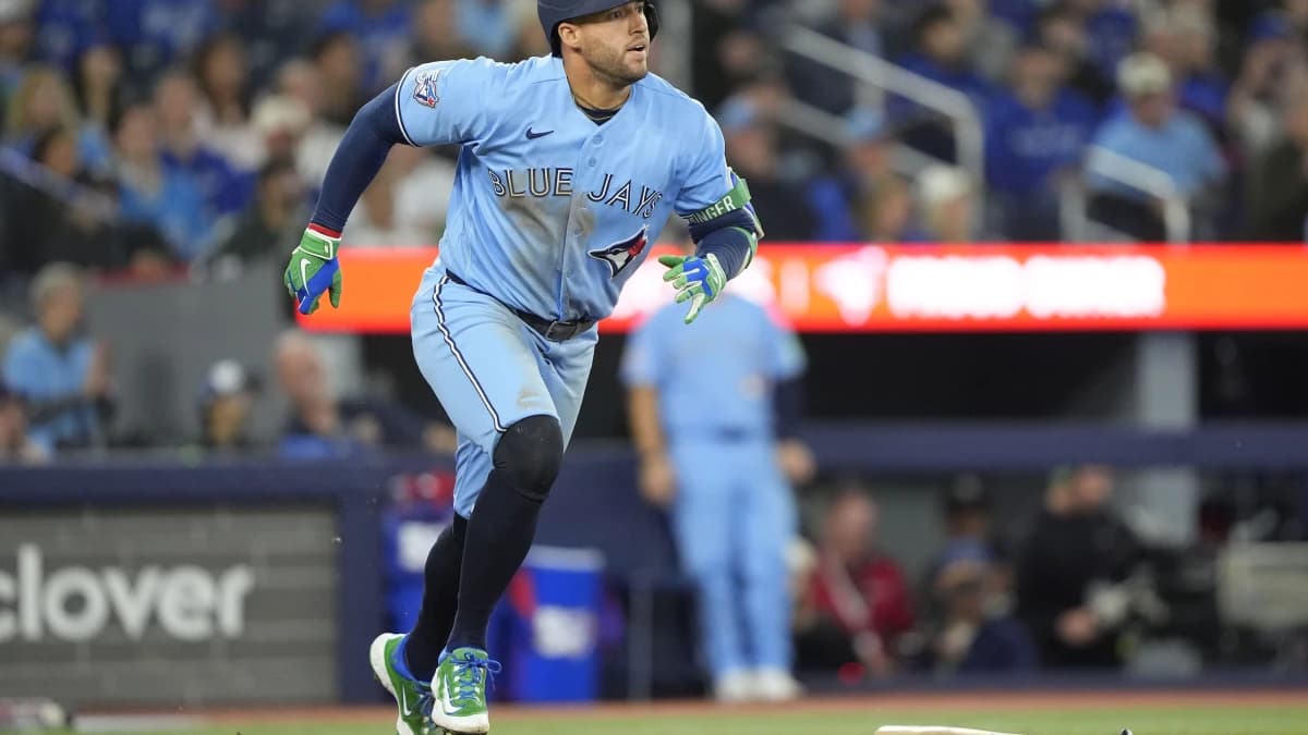 Toronto Blue Jays designated hitter George Springer (4) hits a one run double against the Los Angeles Dodgers during the seventh inning at Rogers Centre.
