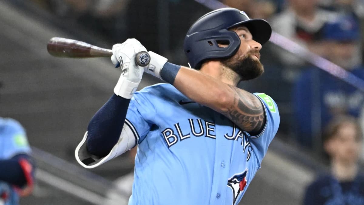 Toronto Blue Jays right fielder Nathan Lukes (38) hits single against the Colorado Rockies in the fifth inning at Rogers Centre