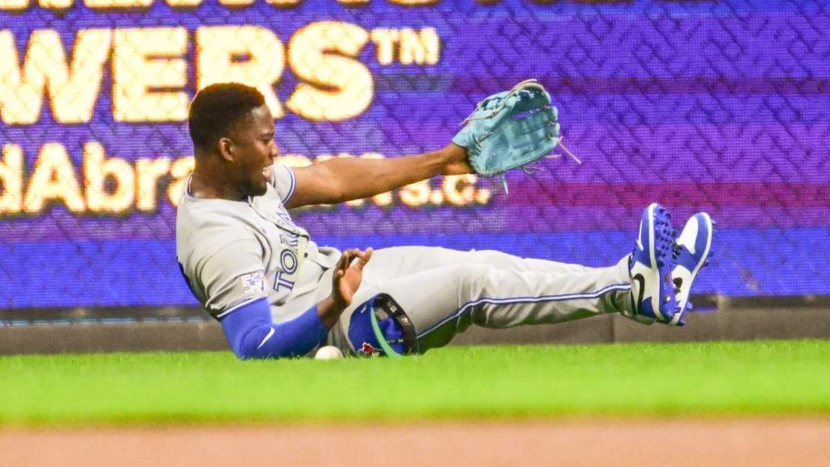 Toronto Blue Jays left fielder Jesus Sanchez (12) can't catch ball hit by Milwaukee Brewers designated hitter William Contreras (not pictured) for a single in the first inning at American Family Field.