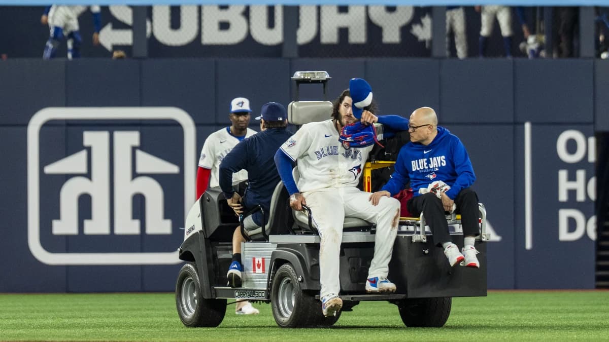 Toronto Blue Jays Cody Ponce (66) tips his cap to the fans upon leaving the game after being injured on a play at first base against the Colorado Rockies during the third inning at Rogers Centre.