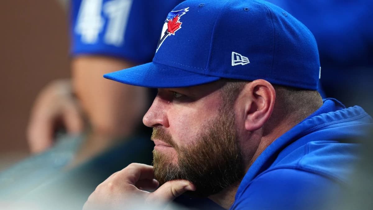 Toronto Blue Jays manager John Schneider (14) looks on against the Arizona Diamondbacks during the seventh inning at Chase Field.