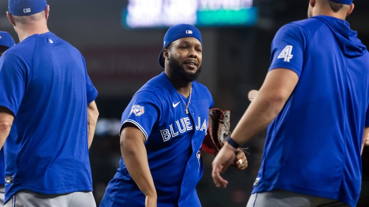 Toronto Blue Jays first baseman Vladimir Guerrero Jr. celebrates with teammates after defeating the Arizona Diamondbacks at Chase Field.