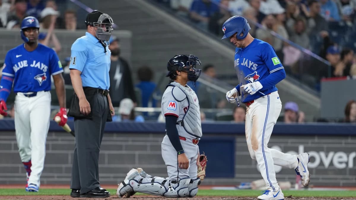 Toronto Blue Jays right fielder Myles Straw (3) scores on a bases loaded walk against the Cleveland Guardians during the seventh inning at Rogers Centre.