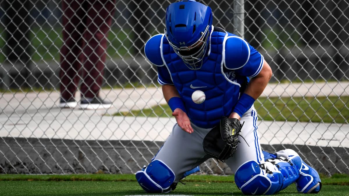 Toronto Blue Jays catcher Reese McGuire (10) blocks a ball during spring training at Spectrum Field.