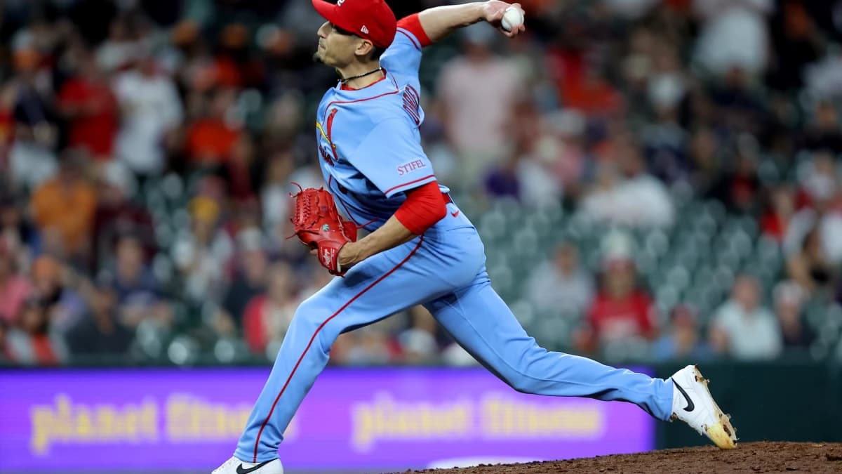 St. Louis Cardinals pitcher Riley O'Brien (61) delivers a pitch against the Houston Astros during the ninth inning at Daikin Park.