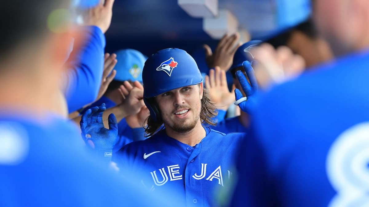 Dunedin, Florida, USA;Toronto Blue Jays third baseman Addison Barger (47) is congratulated in the dugout after he hit a grand slam during the fifth inning against the Boston Red Sox at TD Ballpark.